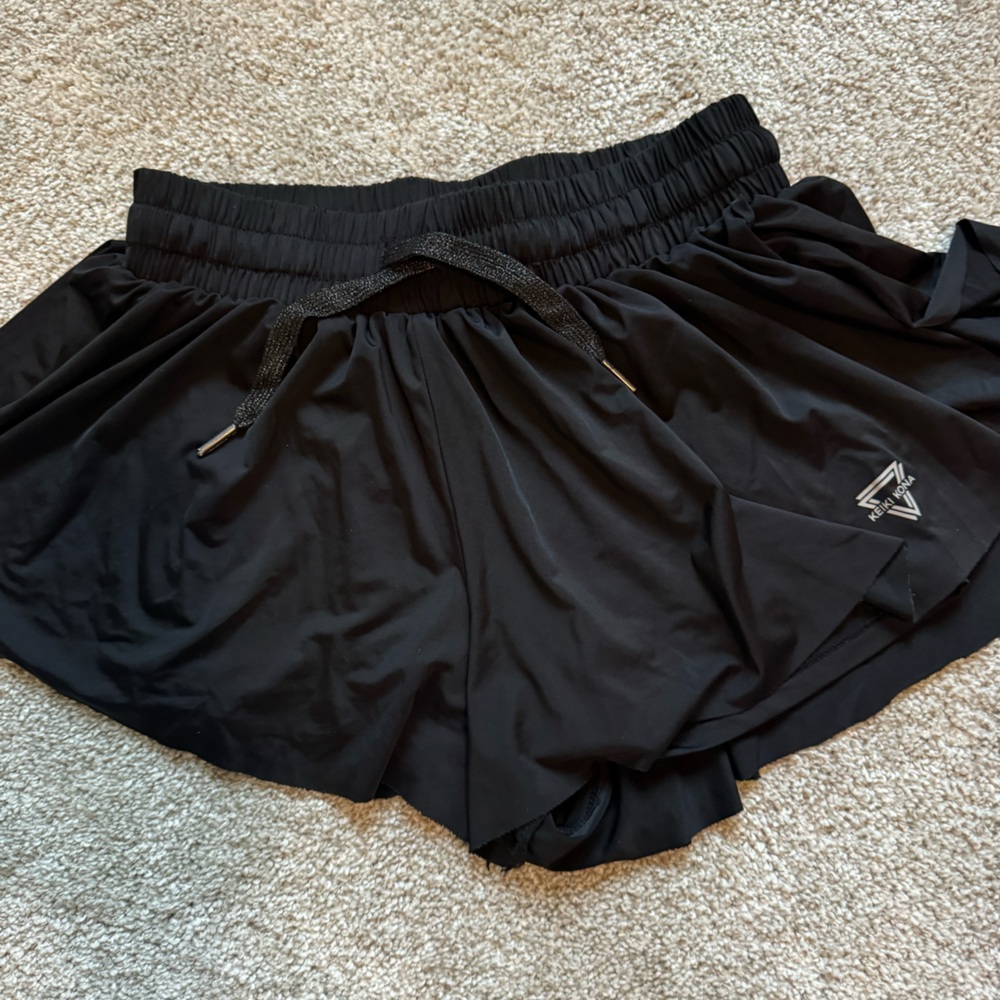 Black Ruched Mini Skirt for Athletic Occasions